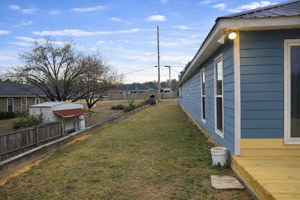 a view of a balcony with chairs