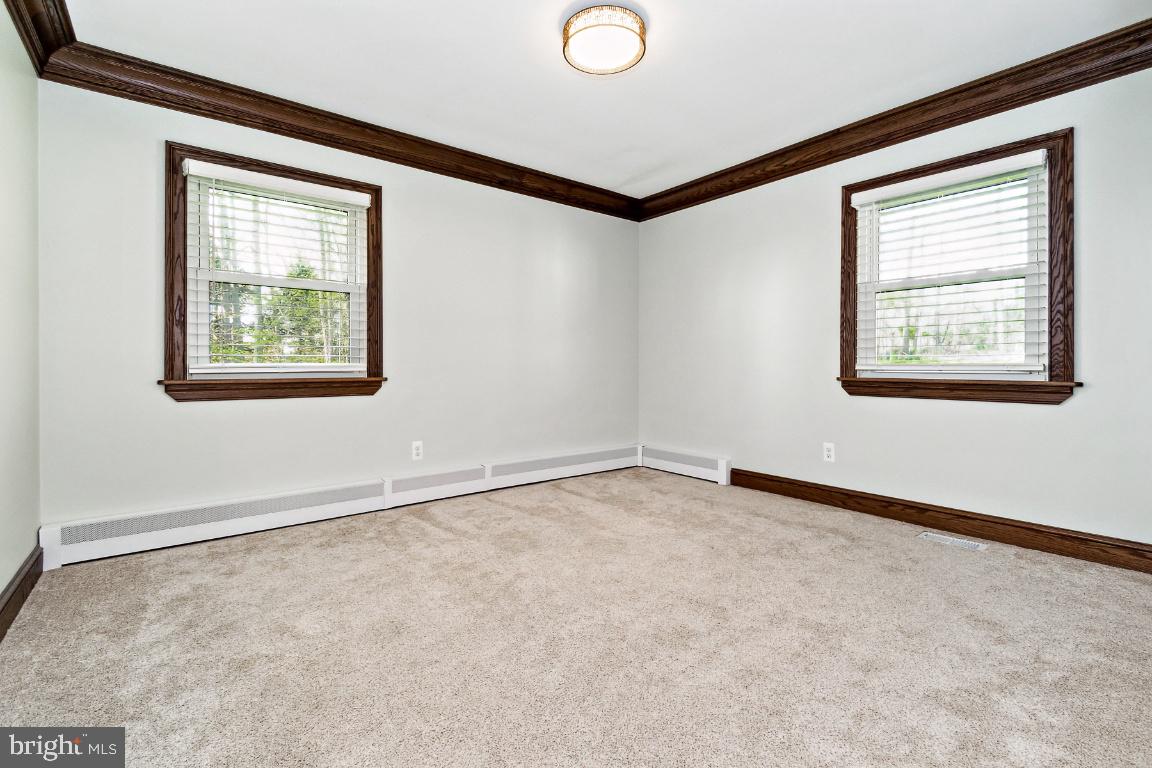 19422 Resh Mill Road Hampstead, MD 21074 - Photo 17 of 55 an empty room with a window