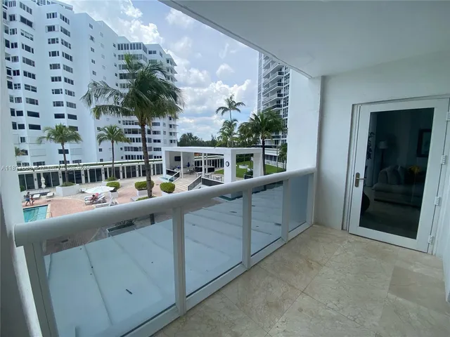 a view of balcony with seating space