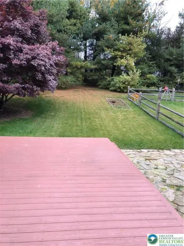 a view of a road with a yard