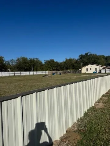 a view of outdoor space and yard