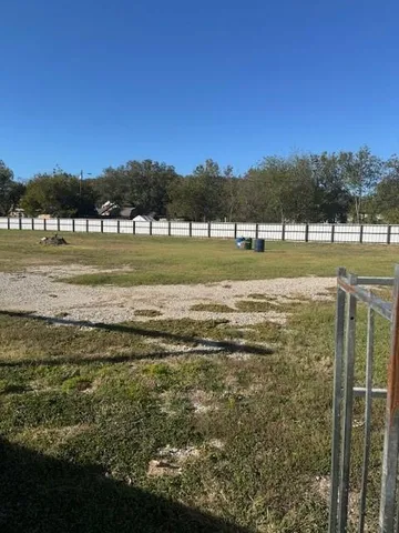 a view of a lake with a big yard