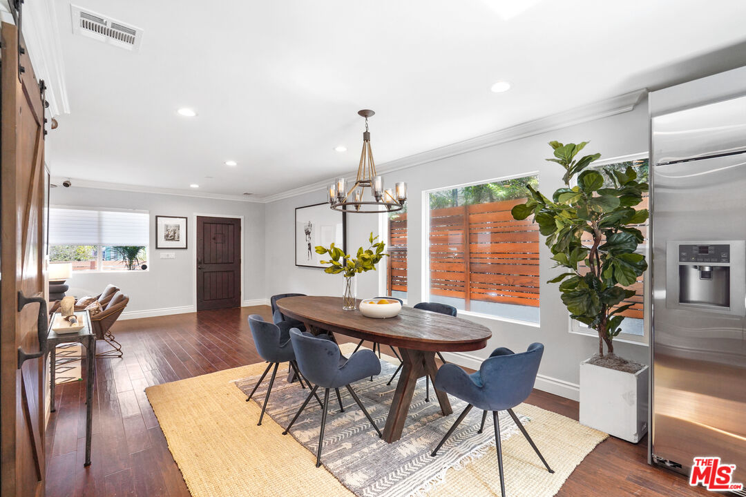 1774 Washington Way Venice, CA 90291 - Photo 11 of 42 a view of a dining room with furniture window and wooden floor
