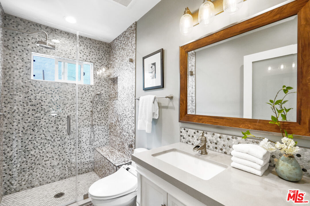 1774 Washington Way Venice, CA 90291 - Photo 18 of 42 a bathroom with a sink toilet and shower