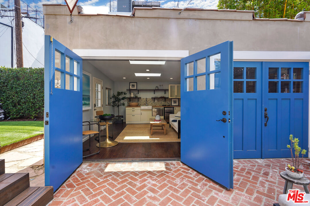 1774 Washington Way Venice, CA 90291 - Photo 30 of 42 a view of a porch with furniture and front door
