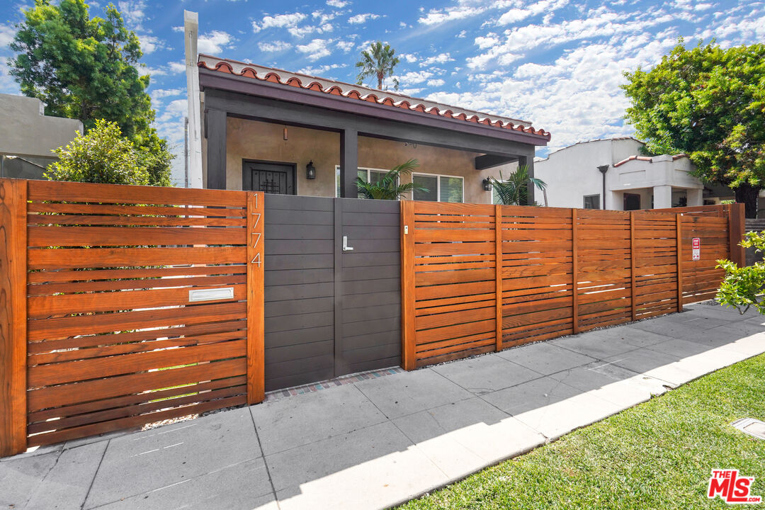 1774 Washington Way Venice, CA 90291 - Photo 3 of 42 a view of a house with a garage