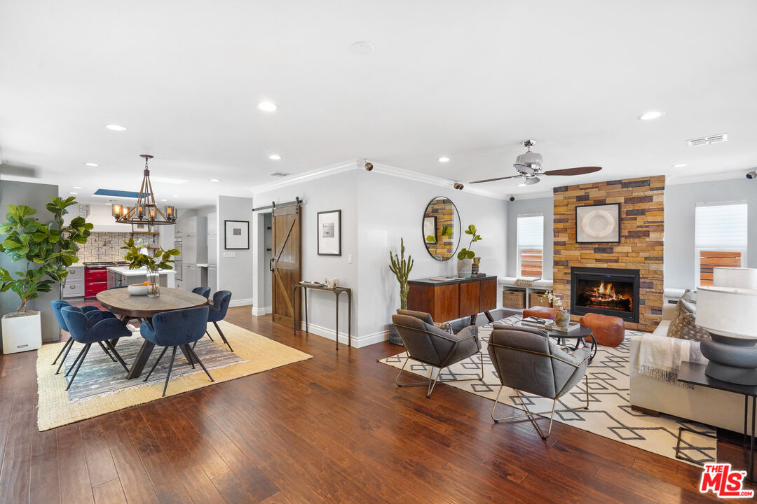 1774 Washington Way Venice, CA 90291 - Photo 6 of 42 a living room with furniture flat screen tv and fireplace