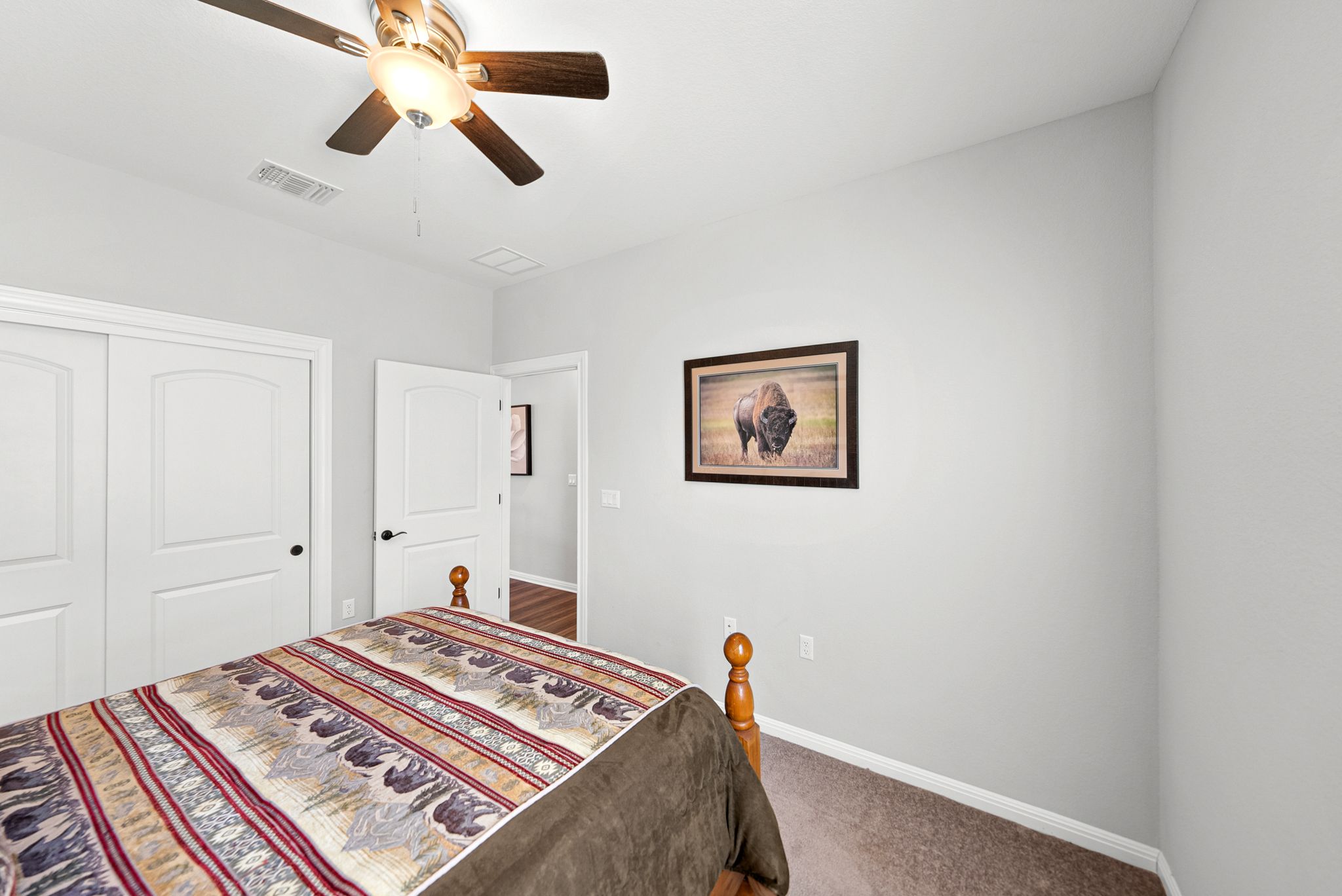 642 Martingale Street Georgetown, TX 78633 - Photo 25 of 40 Every bedroom in this home is designed with comfort in mind, offering bright neutral walls and a spacious closet to help keep your life organized and clutter-free.