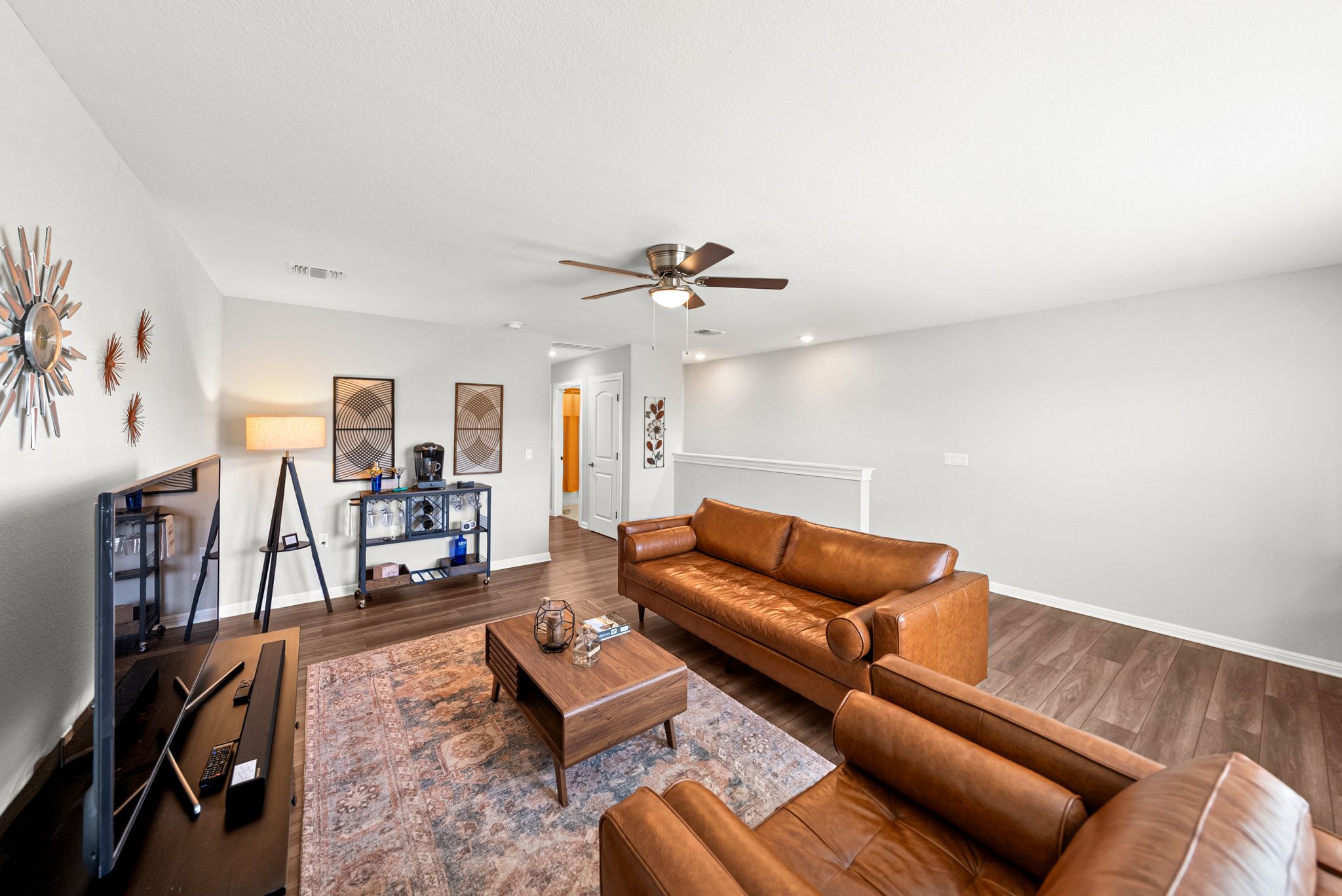 642 Martingale Street Georgetown, TX 78633 - Photo 27 of 40 The upper level reveals a second living area! This versatile loft is perfect for a media room, a secondary hobby space, or a quiet retreat away from the main floor.