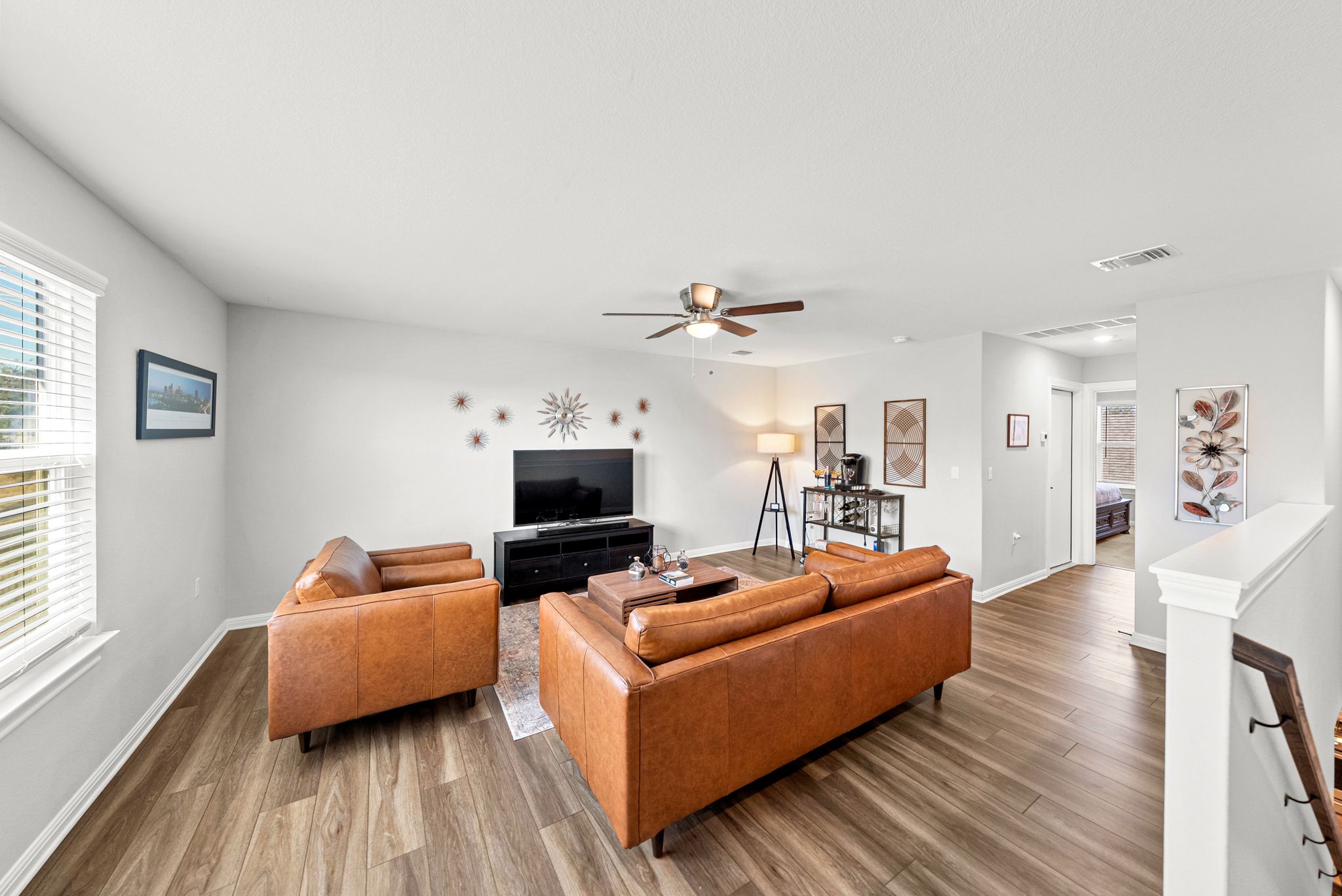 642 Martingale Street Georgetown, TX 78633 - Photo 29 of 40 Whether you need a space for a home gym, a movie marathon, or additional living space, this multi-functional loft provides the extra square footage you’ve been looking for.