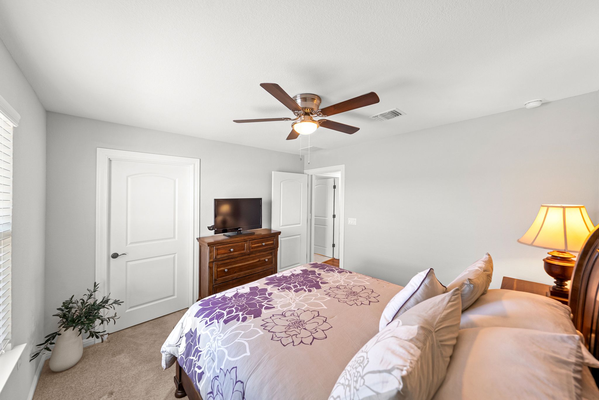 642 Martingale Street Georgetown, TX 78633 - Photo 31 of 40 With large closets and a clean, neutral palette, this room is ready for your personal touch.