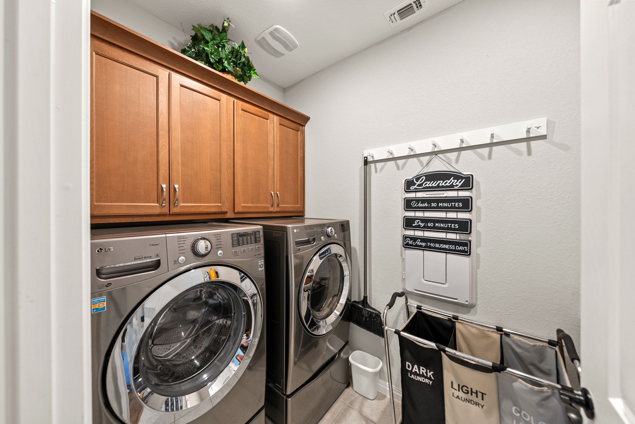642 Martingale Street Georgetown, TX 78633 - Photo 33 of 40 Equipped with overhead cabinetry, this space makes household chores efficient and organized.