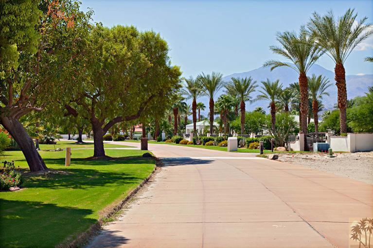 0 Vista Montana Road, Unit LOT 2 La Quinta, CA 92253 - Photo 5 of 11 a row of palm trees and a yard
