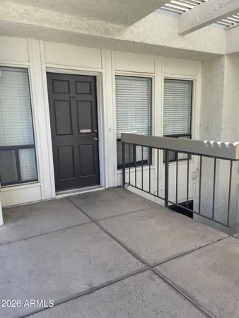 a view of a hallway with windows