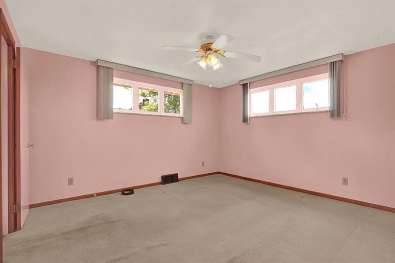 1409 Gill Hall Road Clairton, PA 15025 - Photo 11 of 29 a view of an empty room with chandelier fan