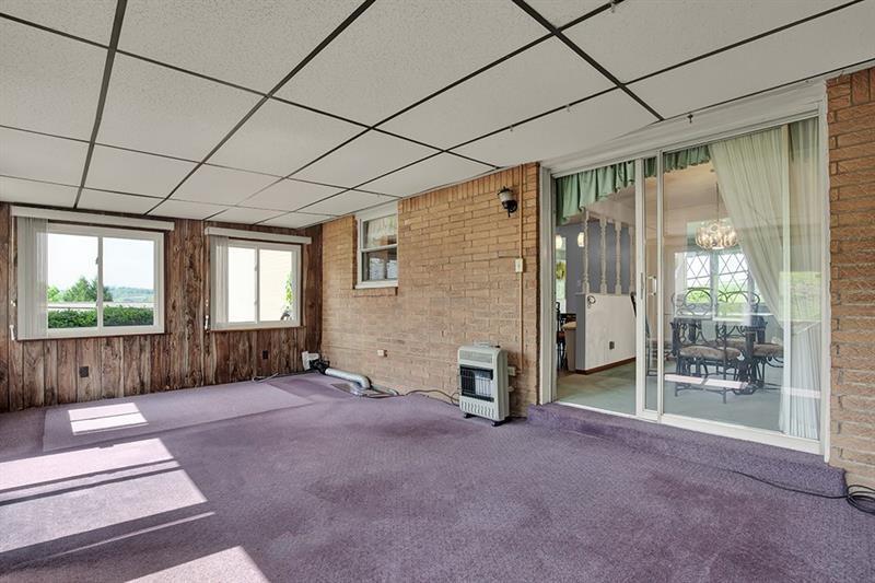 1409 Gill Hall Road Clairton, PA 15025 - Photo 21 of 29 a view of a room with windows