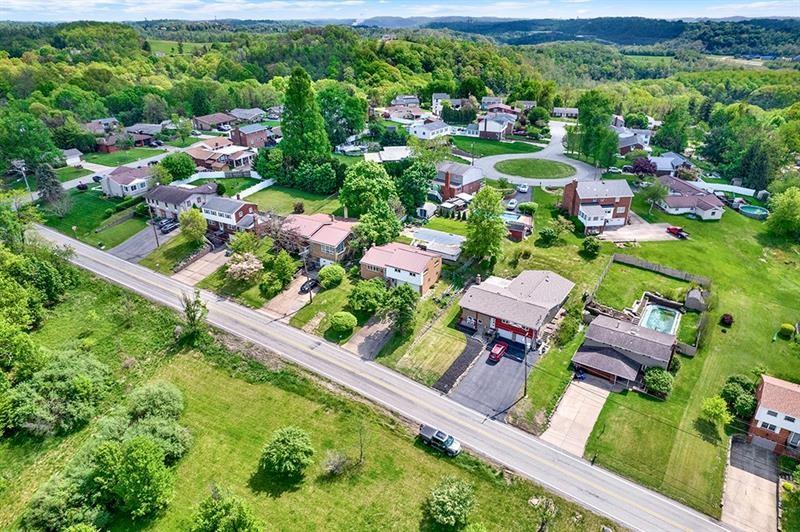 1409 Gill Hall Road Clairton, PA 15025 - Photo 25 of 29 an aerial view of residential house with outdoor space and street view
