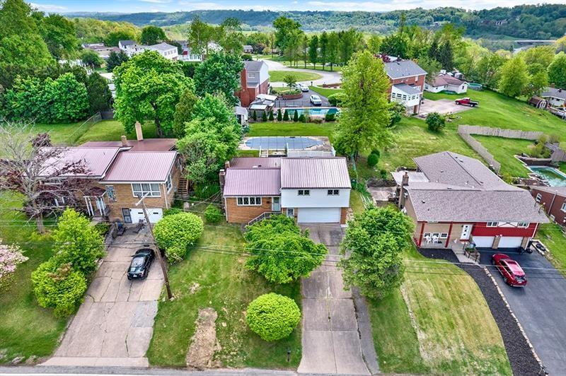 1409 Gill Hall Road Clairton, PA 15025 - Photo 26 of 29 an aerial view of a house with a garden