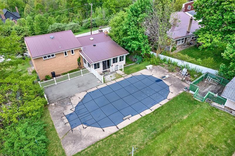 1409 Gill Hall Road Clairton, PA 15025 - Photo 28 of 29 an aerial view of a house with a yard
