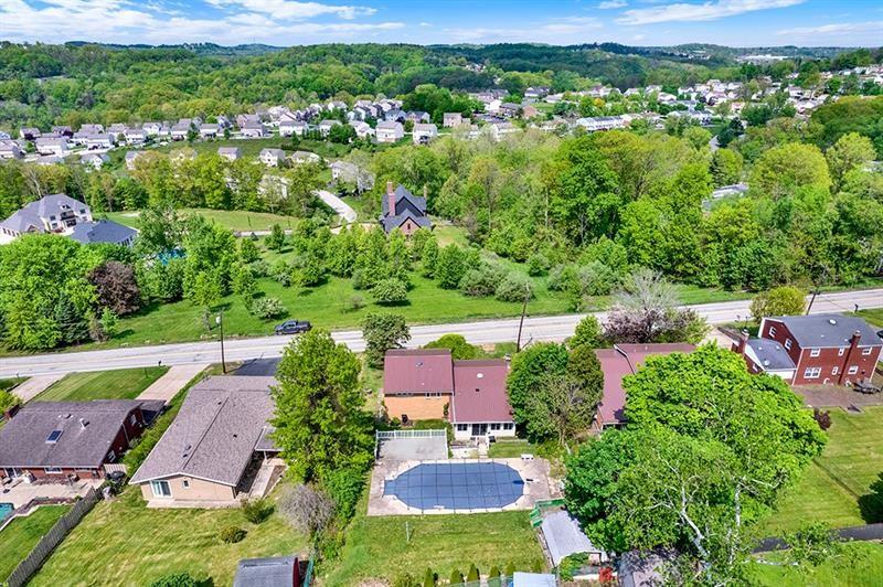 1409 Gill Hall Road Clairton, PA 15025 - Photo 29 of 29 an aerial view of residential houses with outdoor space and street view