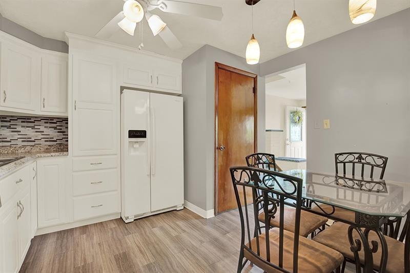 1409 Gill Hall Road Clairton, PA 15025 - Photo 7 of 29 a view of a livingroom with furniture and wooden floor