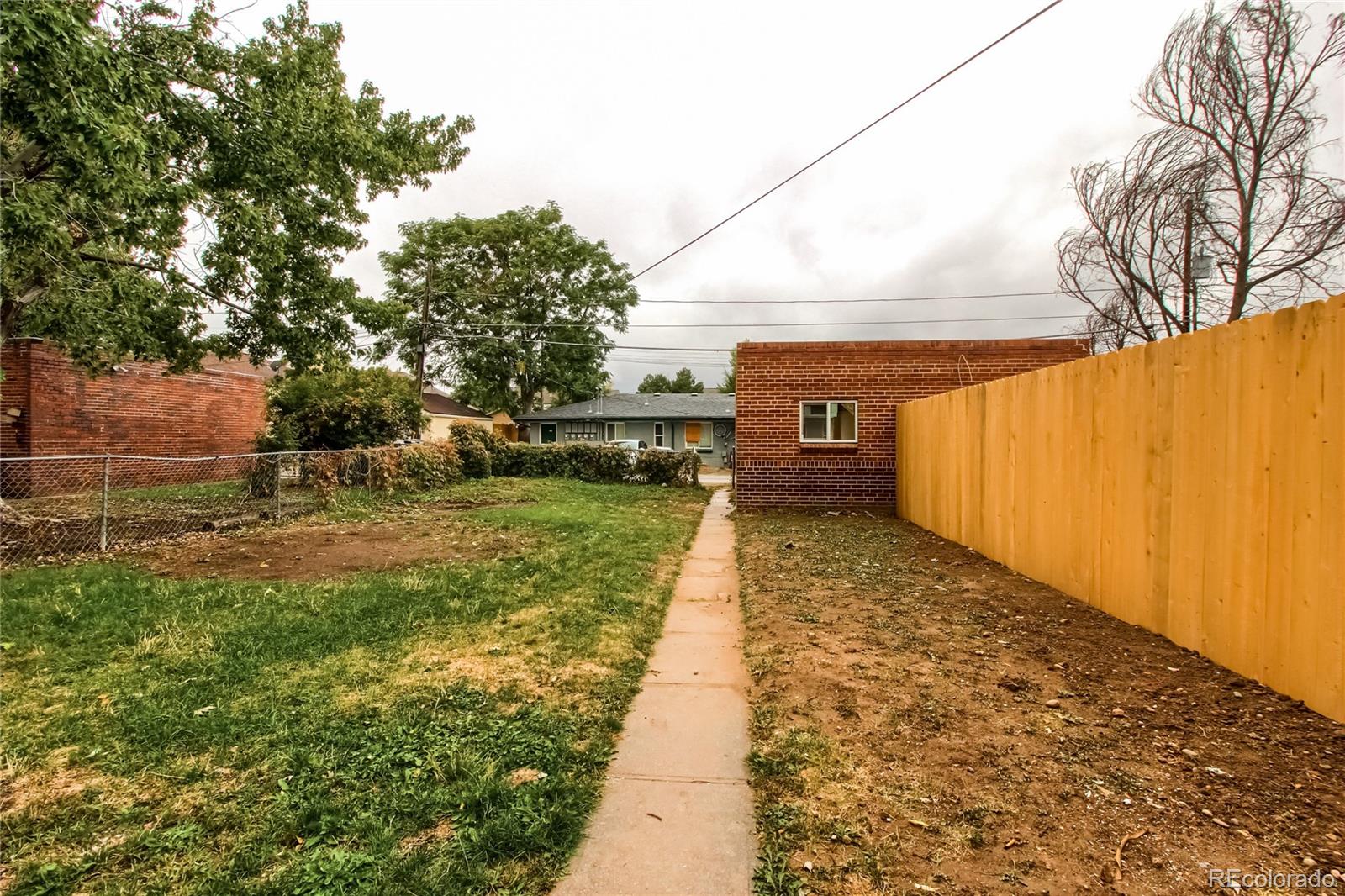 2821 Harrison Street Denver, CO 80205 - Photo 21 of 24 a view of a pathway with a yard