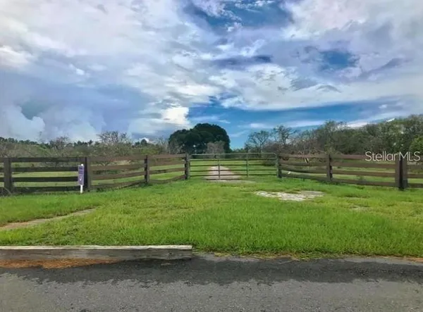 a view of a grassy field