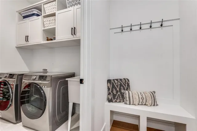 a utility room with dryer and washer