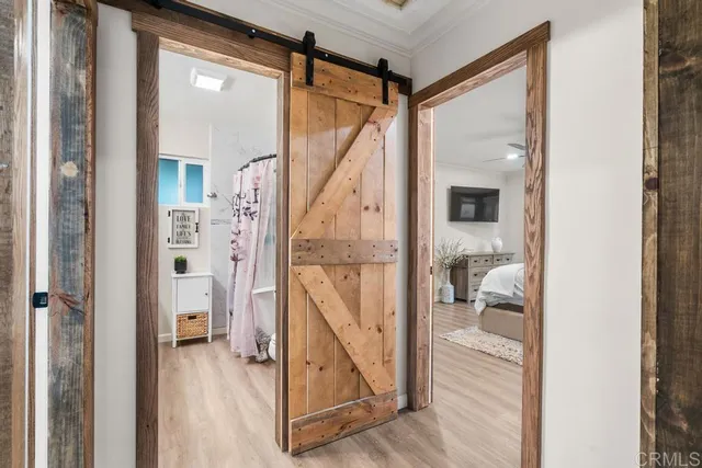 a view of dining table chair and refrigerator