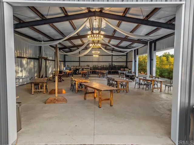 a view of a swimming pool with a yard