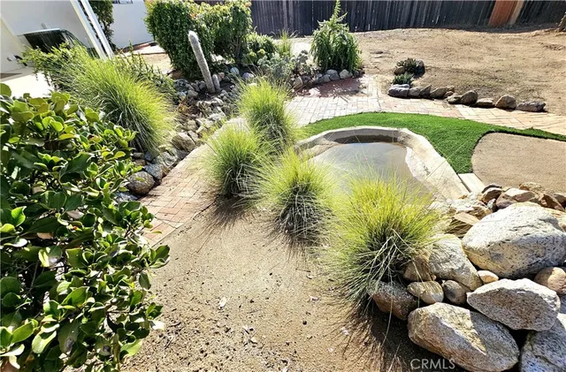 a view of swimming pool with patio