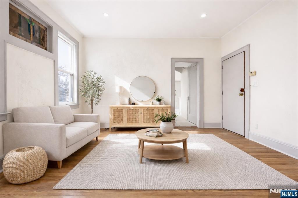 265 North 17th Street, Unit 2L Bloomfield, NJ 07003 - Photo 2 of 9 a living room with furniture