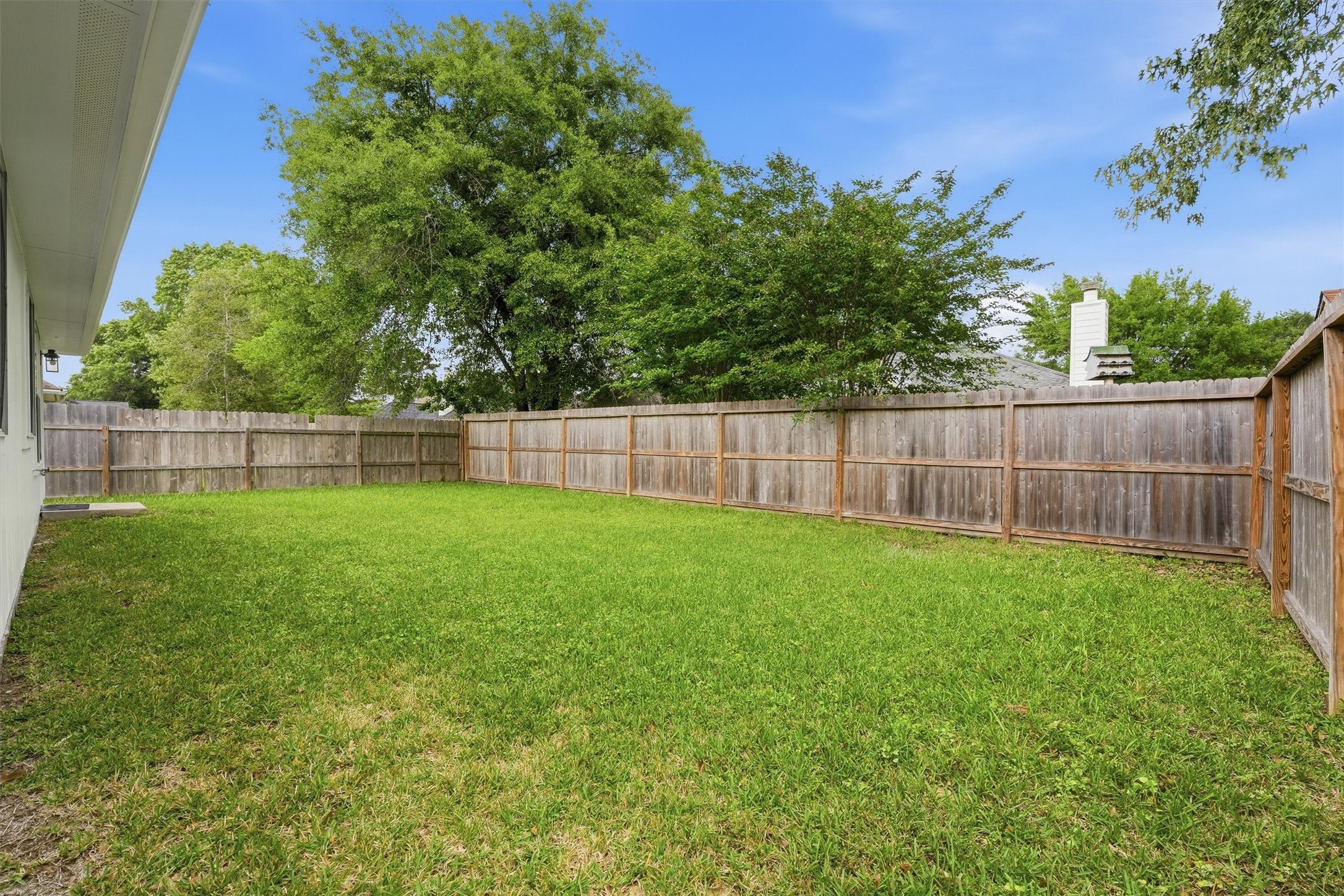 21543 Forest Colony Drive Porter, TX 77365 - Photo 24 of 32 Wide angel view of back of home.