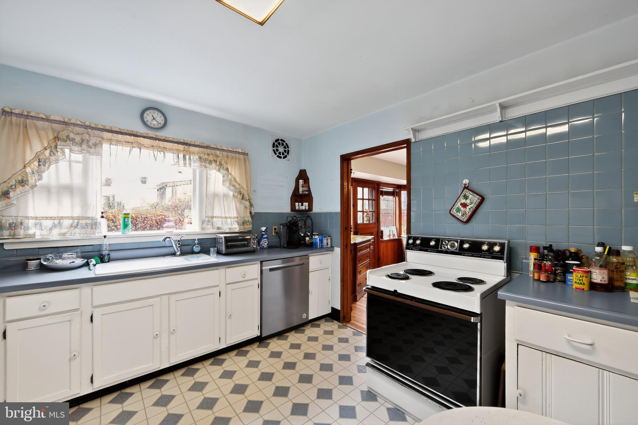 31 Barren Road Newtown Square, PA 19073 - Photo 12 of 27 a kitchen with stainless steel appliances a stove a sink and a refrigerator