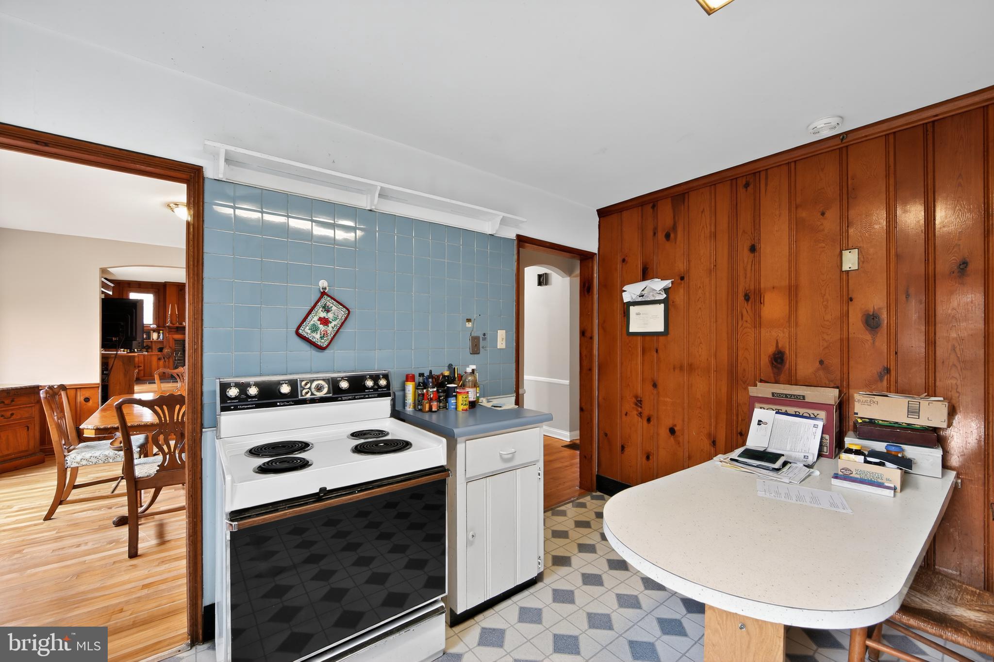 31 Barren Road Newtown Square, PA 19073 - Photo 13 of 27 a room with furniture a mirror and a wooden floor