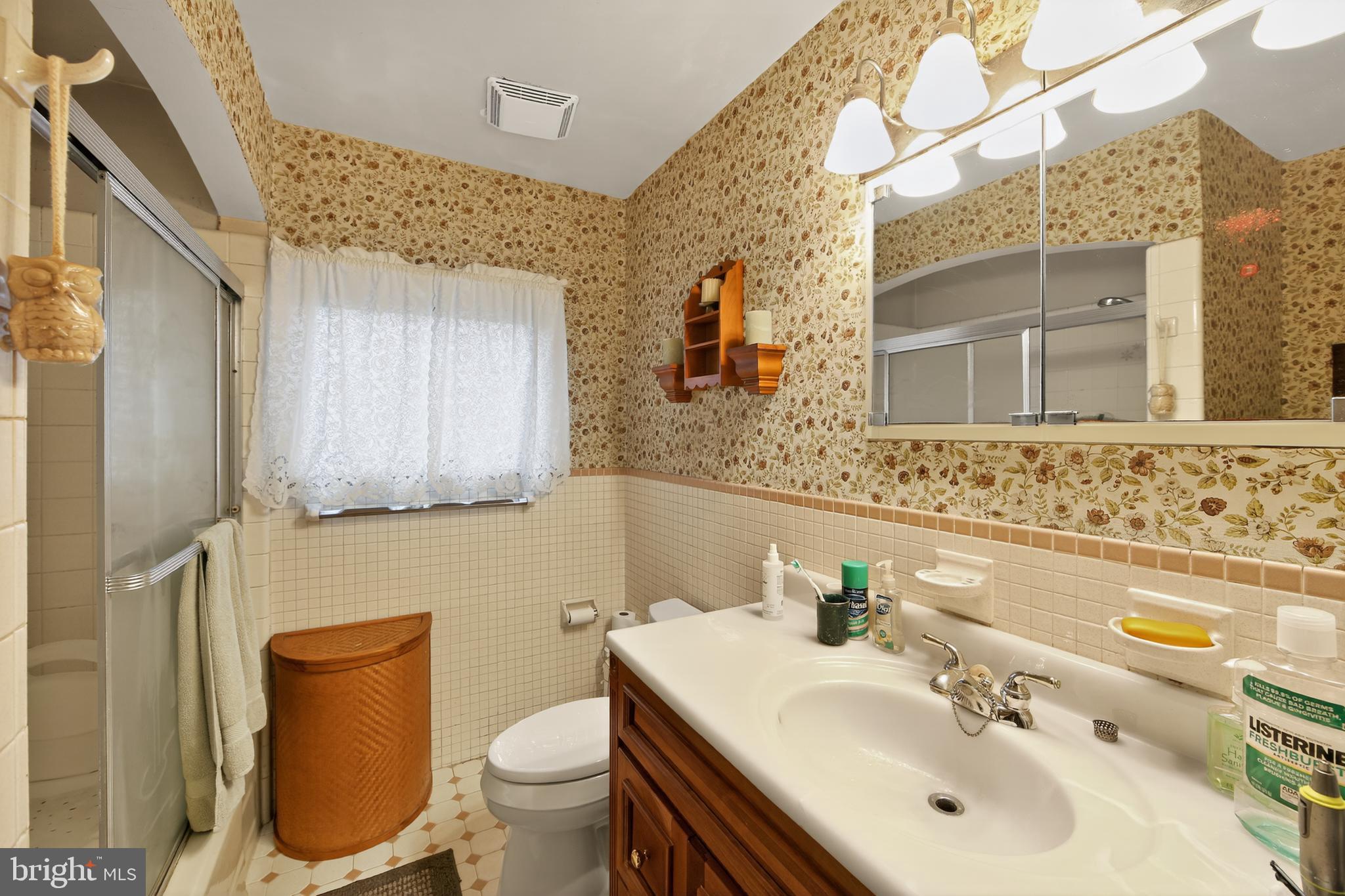 31 Barren Road Newtown Square, PA 19073 - Photo 18 of 27 a bathroom with a sink toilet and mirror