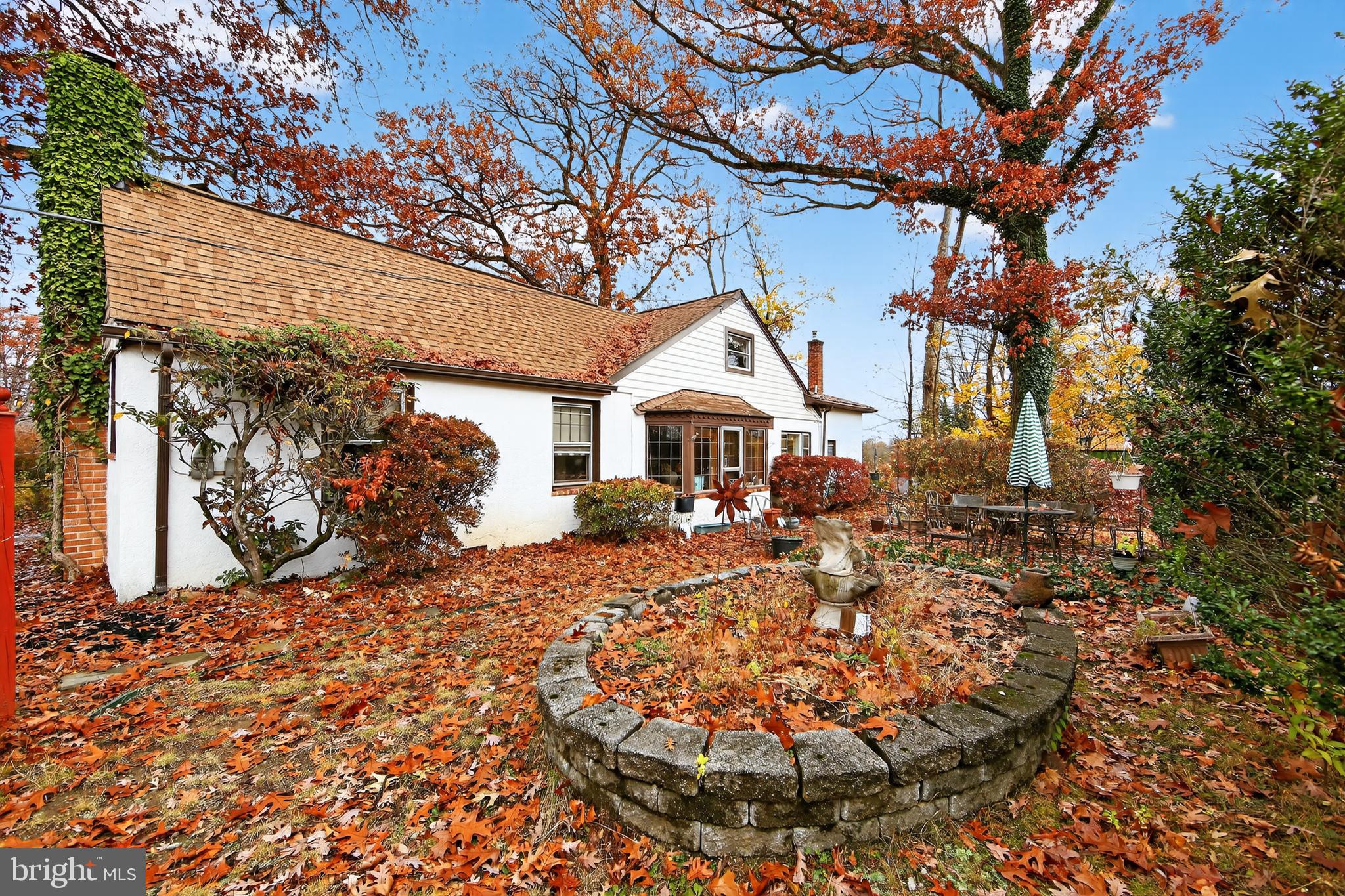 31 Barren Road Newtown Square, PA 19073 - Photo 3 of 27 a front view of a house with a yard