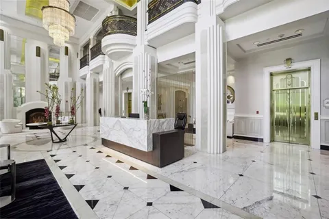 a view of a backyard with sitting area