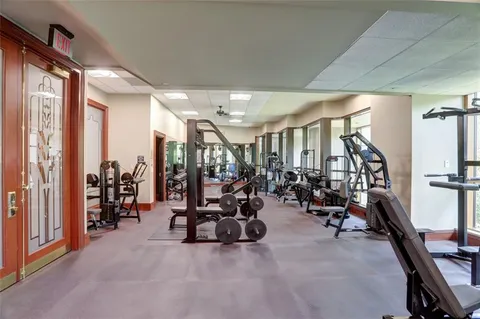 a swimming pool with outdoor seating and yard