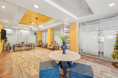 a spacious bathroom with a sink a mirror and a shower