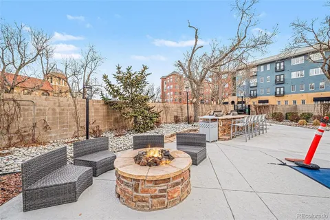 a outdoor living space with furniture and a potted plant