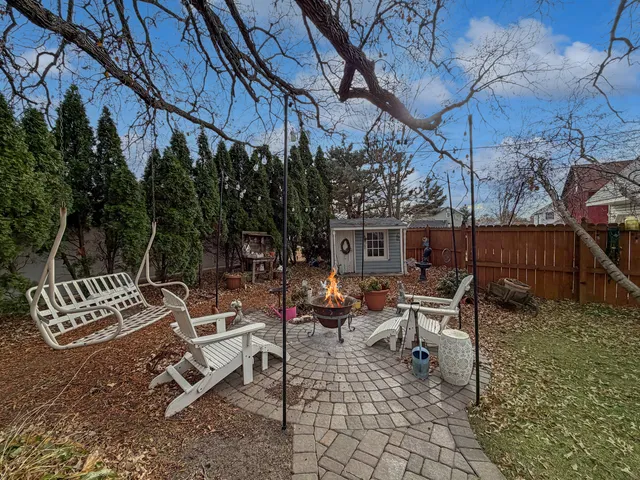 a bed room with a bed and a window