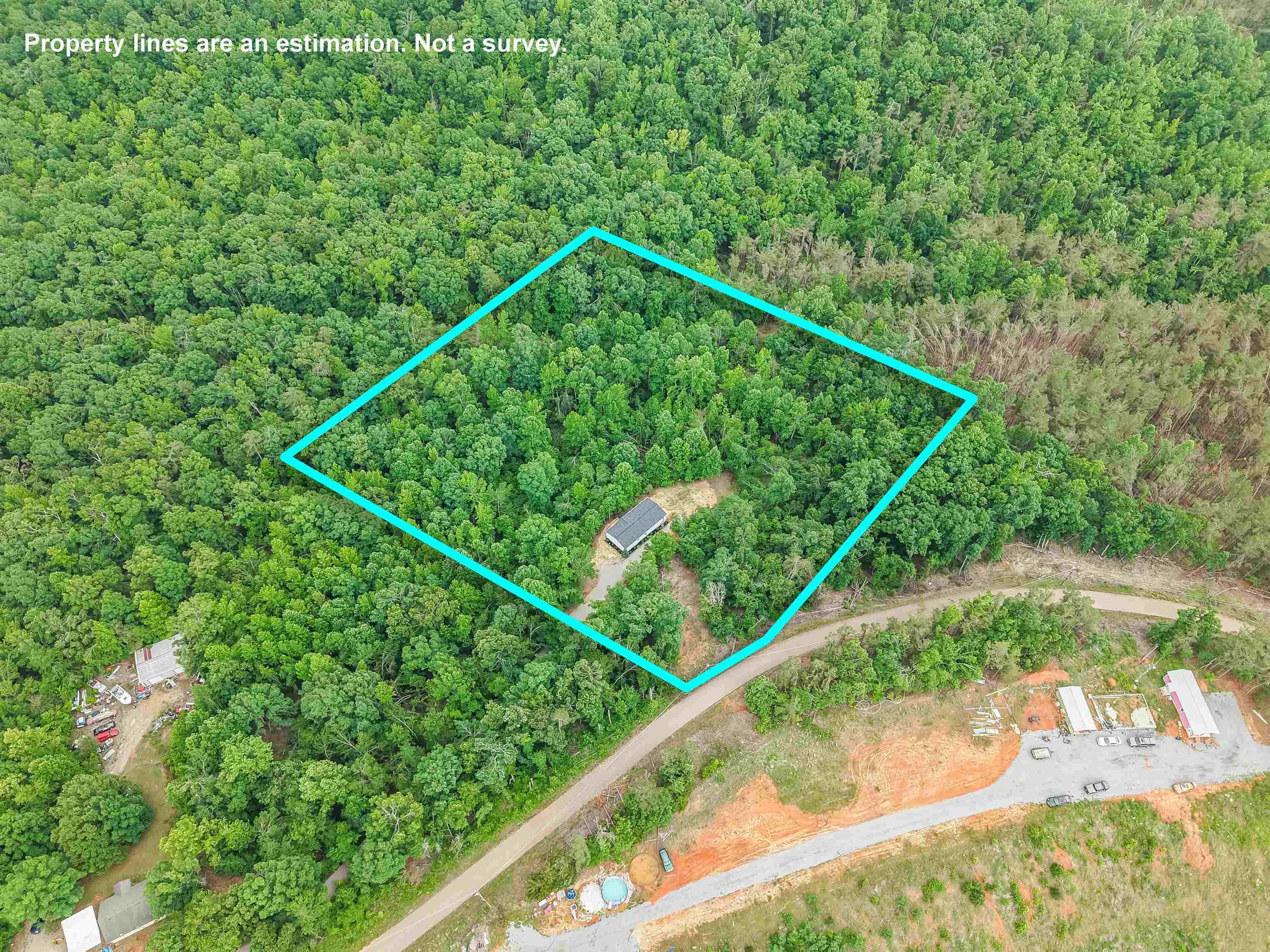 890 Burks Road Savannah, TN 38372 - Photo 2 of 40 a wooden bridge sitting in the middle of a forest