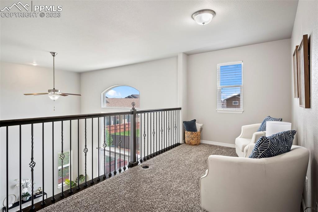 13232 Park Meadows Drive Peyton, CO 80831 - Photo 15 of 23 a living room with furniture and a window