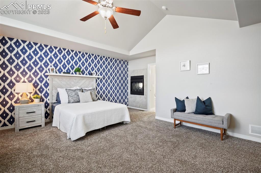 13232 Park Meadows Drive Peyton, CO 80831 - Photo 18 of 23 a bedroom with a bed and white walls