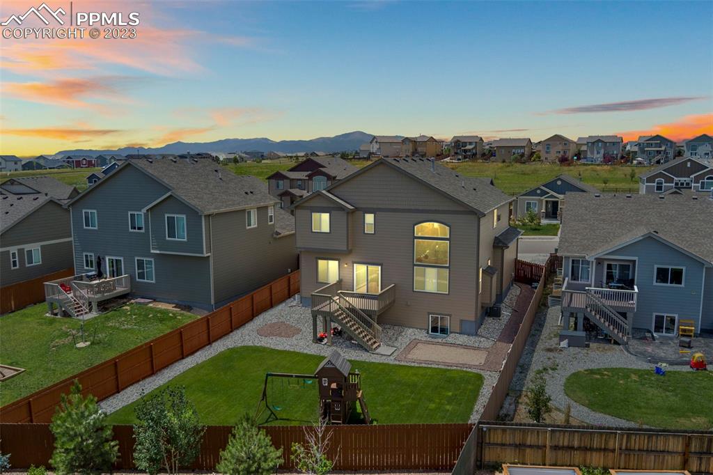 13232 Park Meadows Drive Peyton, CO 80831 - Photo 5 of 23 an aerial view of a house with swimming pool garden and patio