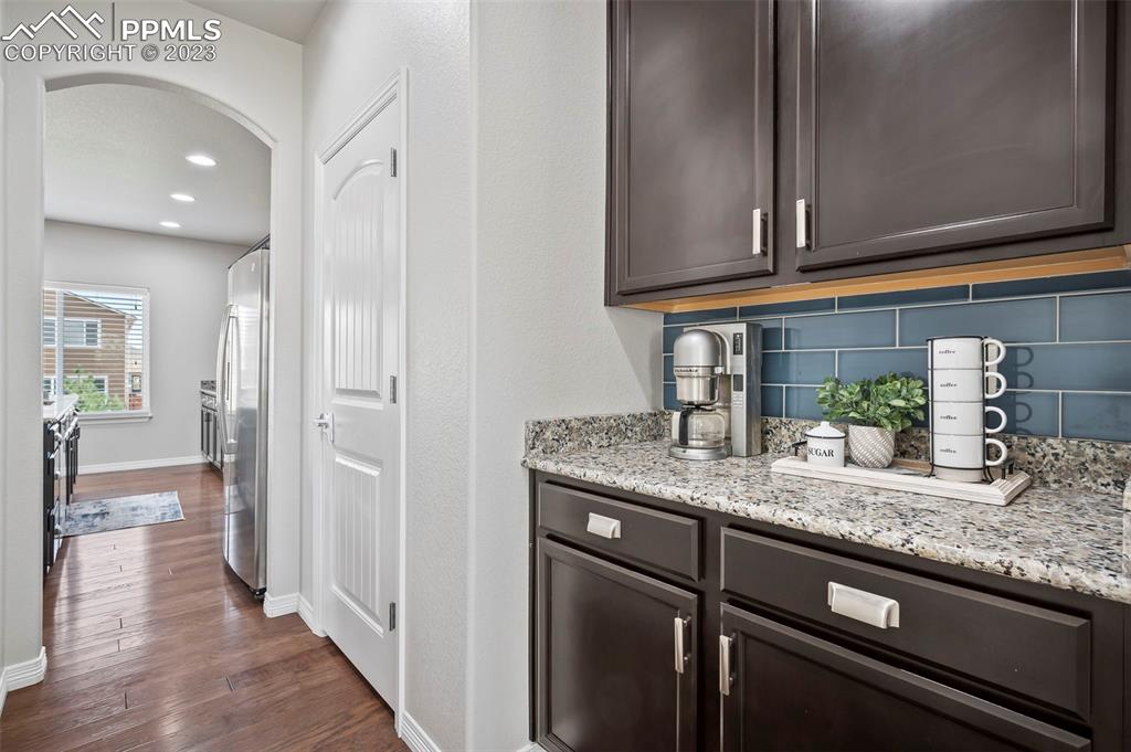 13232 Park Meadows Drive Peyton, CO 80831 - Photo 8 of 23 a kitchen with granite countertop stainless steel appliances and sink