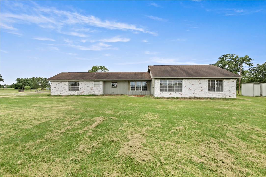 8166 Riley Road Bryan, TX 77808 - Photo 10 of 47 a front view of a house with a garden