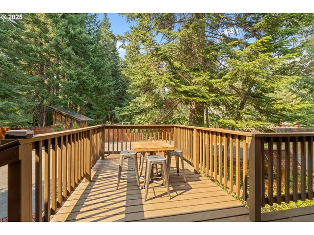 a view of balcony with wooden floor