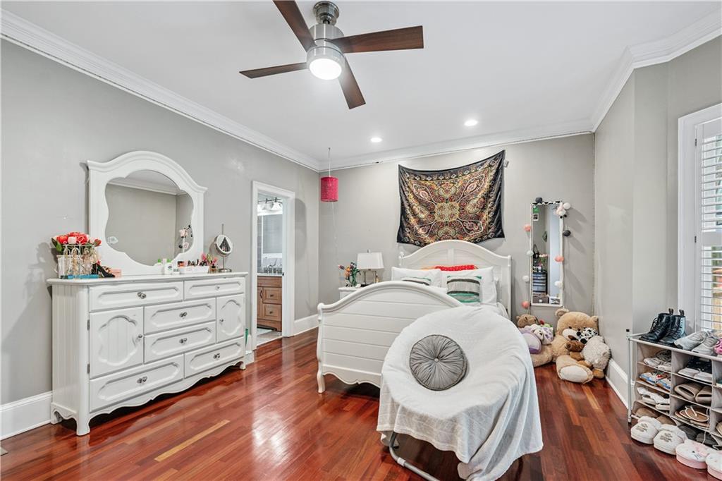 2012 Arbor Springs Way Buford, GA 30519 - Photo 14 of 61 a bed room with a bed mirror and a window